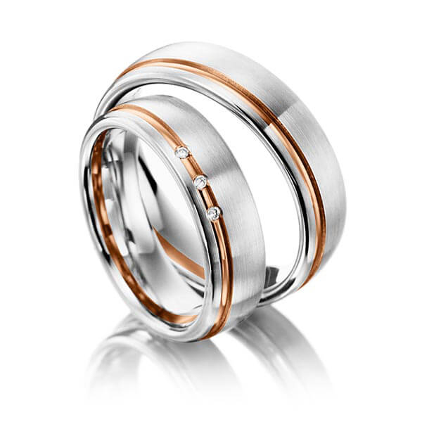 Paar bicolor Trauringe/Eheringe in Graugold 585 Rotgold 585 mit zus. 0,03 ct. Brillant tw, vs von acredo - S-1062-6 Paar bicolor Trauringe/Eheringe in Graugold 585 Rotgold 585 mit zus. 0,03 ct. Brillant tw, vs von acredo - S-1062-6
