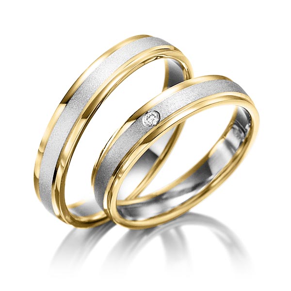 Set Bicolor trouwringen in geelgoud 14 kt. grijsgoud 14 kt. met in totaal 0,01 ct. Briljant tw/si - NP-1017-5 Set Bicolor trouwringen in geelgoud 14 kt. grijsgoud 14 kt. met in totaal 0,01 ct. Briljant tw/si - NP-1017-5