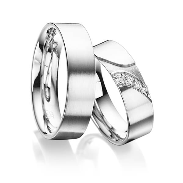 Set klassieke trouwringen in buiten witgoud 14 kt. , binnen witgoud 14 kt. met in totaal 0,075 ct. Briljant tw/si van acredo - A-3021-12 Set klassieke trouwringen in buiten witgoud 14 kt. , binnen witgoud 14 kt. met in totaal 0,075 ct. Briljant tw/si van acredo - A-3021-12