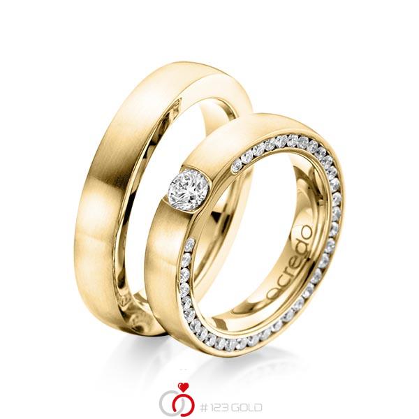 Set klassieke trouwringen in geelgoud 14 kt. met 0,3 ct. + in totaal 1,08 ct. Briljant tw/si van acredo - A-1107-3 Set klassieke trouwringen in geelgoud 14 kt. met 0,3 ct. + in totaal 1,08 ct. Briljant tw/si van acredo - A-1107-3