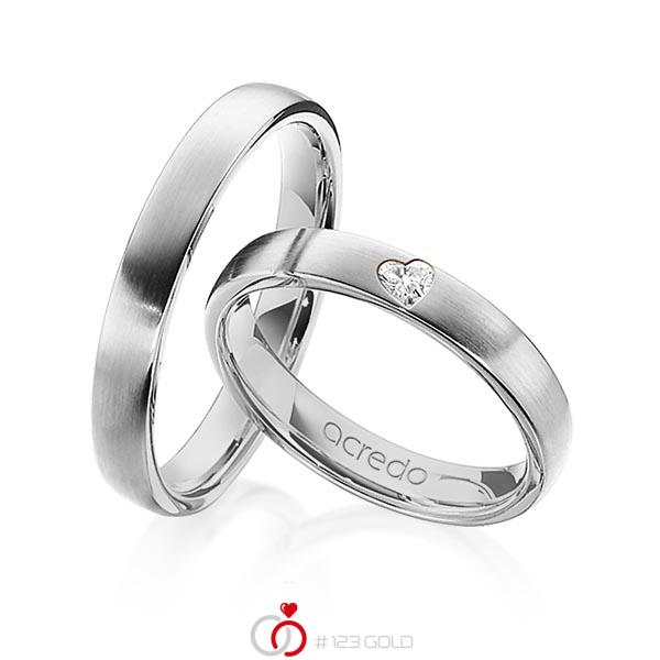Set klassieke trouwringen in grijsgoud 14 kt. met in totaal 0,08 ct. Hart-Diamant tw,vs van acredo - A-1242-2 Set klassieke trouwringen in grijsgoud 14 kt. met in totaal 0,08 ct. Hart-Diamant tw,vs van acredo - A-1242-2