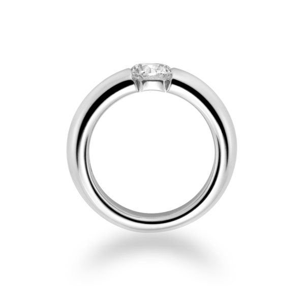 Diamond ring with tension setting