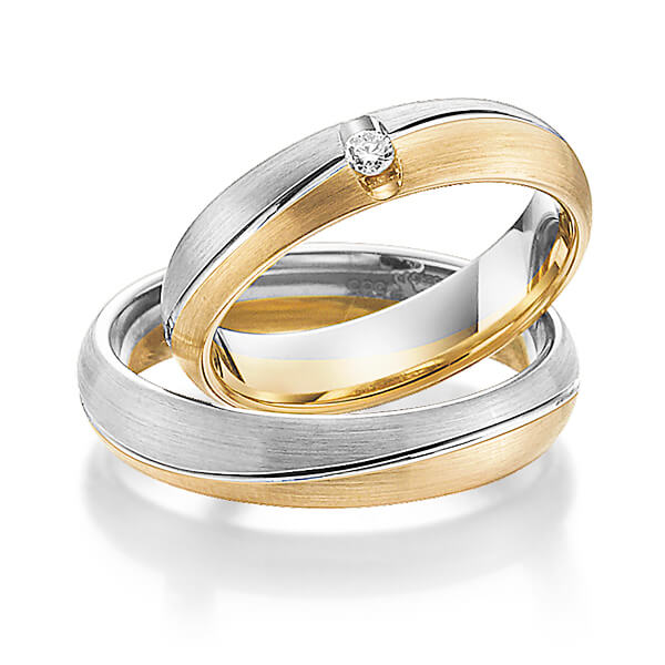 Paar bicolor Trauringe/Eheringe in Weißgold 585 Gelbgold 585 mit zus. 0,05 ct. Brillant tw, si von Steinberg - Q-1185-5 Paar bicolor Trauringe/Eheringe in Weißgold 585 Gelbgold 585 mit zus. 0,05 ct. Brillant tw, si von Steinberg - Q-1185-5