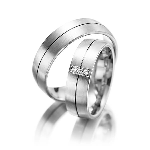 Paar klassische Trauringe/Eheringe in Weißgold 585 mit zus. 0,03 ct. Brillant tw, si von Merii - M-1141-4 Paar klassische Trauringe/Eheringe in Weißgold 585 mit zus. 0,03 ct. Brillant tw, si von Merii - M-1141-4