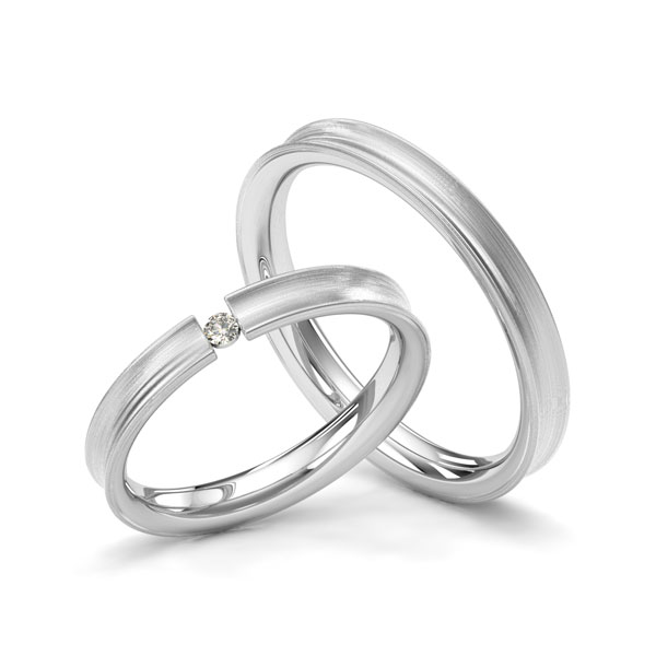 Paar klassische Trauringe/Eheringe in Weißgold 585 mit zus. 0,03 ct. Brillant tw, si von Merii - M-1218-5 Paar klassische Trauringe/Eheringe in Weißgold 585 mit zus. 0,03 ct. Brillant tw, si von Merii - M-1218-5