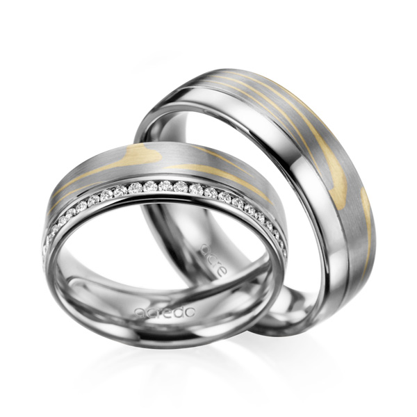 Set Bicolor Memoire-trouwringen in palladium-zilver 800 groengoud, grijsgoud 14 kt. volledig gezet met in totaal 0,5 ct. Briljant tw/si van acredo - A-3121-1 Set Bicolor Memoire-trouwringen in palladium-zilver 800 groengoud, grijsgoud 14 kt. volledig gezet met in totaal 0,5 ct. Briljant tw/si van acredo - A-3121-1