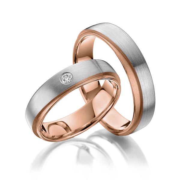 Set Bicolor trouwringen in buiten grijsgoud 14 kt. , binnen roodgoud 14 kt. met in totaal 0,05 ct. Briljant tw/si van Steinberg - T-1073-1 Set Bicolor trouwringen in buiten grijsgoud 14 kt. , binnen roodgoud 14 kt. met in totaal 0,05 ct. Briljant tw/si van Steinberg - T-1073-1