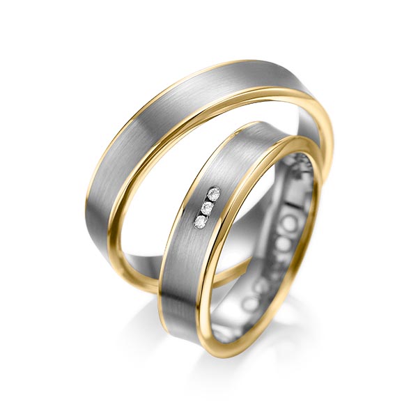 Set Bicolor trouwringen in geelgoud 14 kt. dark grey gold 14 kt. met in totaal 0,03 ct. Briljant tw/si van acredo - A-1055-13 Set Bicolor trouwringen in geelgoud 14 kt. dark grey gold 14 kt. met in totaal 0,03 ct. Briljant tw/si van acredo - A-1055-13