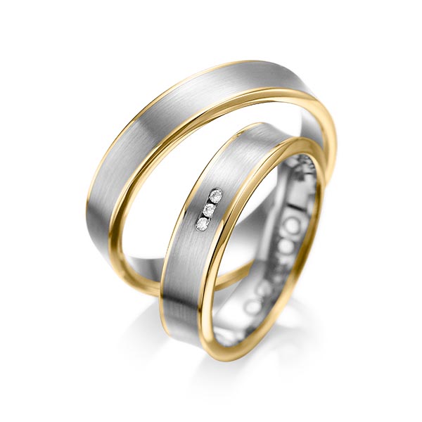 Set Bicolor trouwringen in geelgoud 14 kt. grijsgoud 14 kt. met in totaal 0,03 ct. Briljant tw/si van acredo - A-1055-5 Set Bicolor trouwringen in geelgoud 14 kt. grijsgoud 14 kt. met in totaal 0,03 ct. Briljant tw/si van acredo - A-1055-5