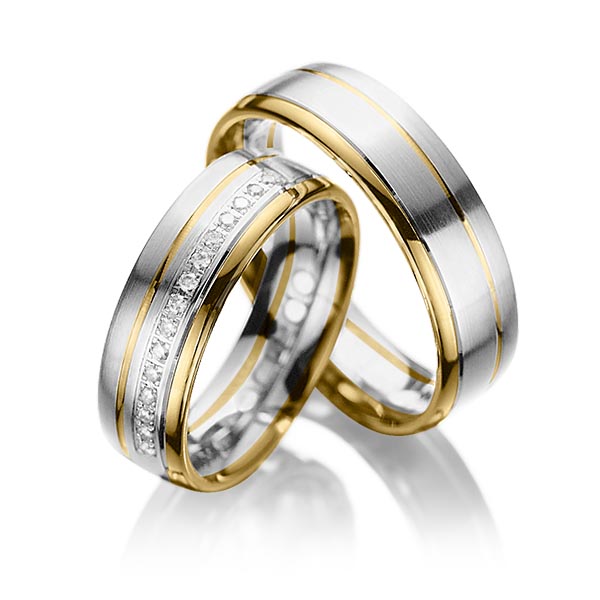 Set Bicolor trouwringen in geelgoud 14 kt. witgoud 14 kt. met in totaal 0,15 ct. Briljant tw/si van acredo - A-1034-1 Set Bicolor trouwringen in geelgoud 14 kt. witgoud 14 kt. met in totaal 0,15 ct. Briljant tw/si van acredo - A-1034-1