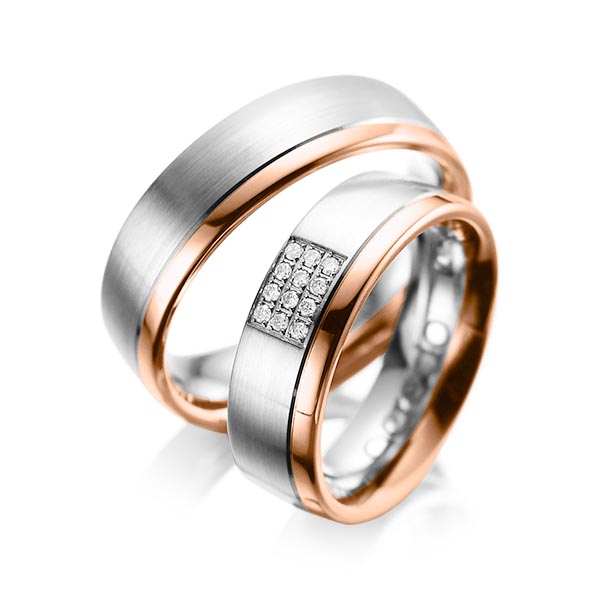 Set Bicolor trouwringen in grijsgoud 14 kt. roodgoud 14 kt. met in totaal 0,096 ct. Briljant tw/si van acredo - A-1043-7 Set Bicolor trouwringen in grijsgoud 14 kt. roodgoud 14 kt. met in totaal 0,096 ct. Briljant tw/si van acredo - A-1043-7