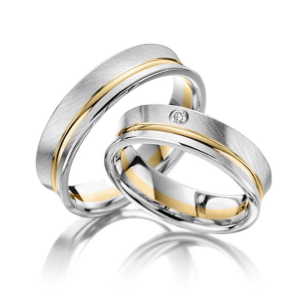 Set Bicolor trouwringen in witgoud 14 kt. geelgoud 14 kt. met in totaal 0,02 ct. Briljant tw/si van Steinberg - T-1132-5 Set Bicolor trouwringen in witgoud 14 kt. geelgoud 14 kt. met in totaal 0,02 ct. Briljant tw/si van Steinberg - T-1132-5
