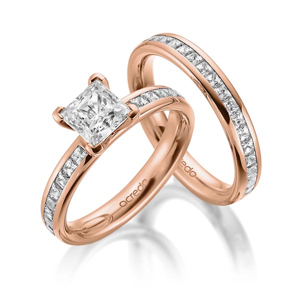 Set in roodgoud 14 kt. met 1 ct. + in totaal 1,05 ct. Briljant & Princess-Diamant tw,vs tw/si van acredo - A-2004-4 Set in roodgoud 14 kt. met 1 ct. + in totaal 1,05 ct. Briljant & Princess-Diamant tw,vs tw/si van acredo - A-2004-4